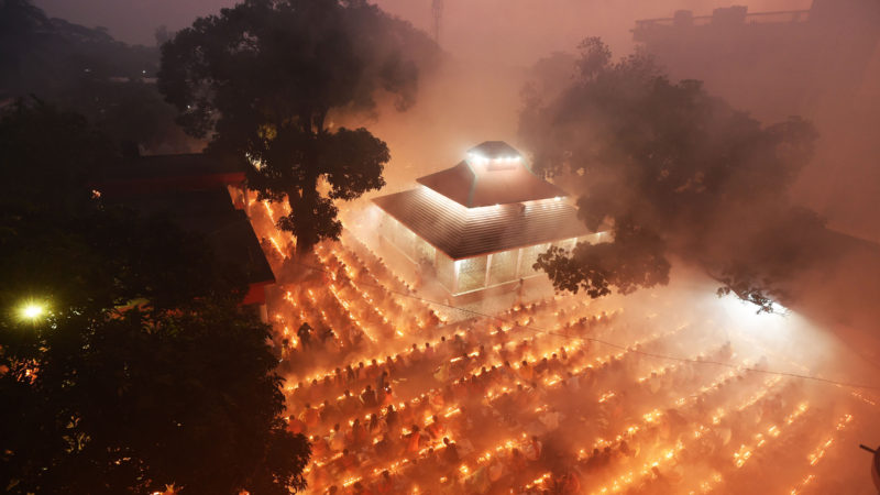 Hindu devotees pray during the Rakher Upobash, a religious fasting festival, at a temple in Narayanganj district on the outskirts of Bangladeshi capital Dhaka, on Nov. 7, 2020. 