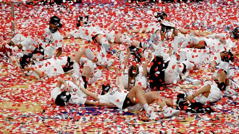 LAS VEGAS, NEVADA - MARCH 07: The Stanford Cardinal celebrate with confetti on the court as they celebrate their 75-55 victory over the UCLA Bruins to win the championship game of the Pac-12 Conference women's basketball tournament at Michelob ULTRA Arena on March 7, 2021 in Las Vegas, Nevada.   Ethan Miller/Getty Images/AFP  == FOR NEWSPAPERS, INTERNET, TELCOS & TELEVISION USE ONLY ==