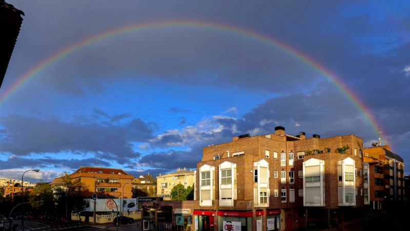 (210411) -- MADRID, April 11, 2021 (Xinhua) -- A rainbow is seen in the sky above Madrid, Spain, on April 11, 2021. (Xinhua/Meng Dingbo)