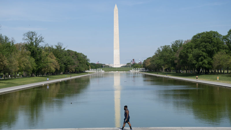 A man walks past the Lincoln Memorial Reflecting Pool in Washington, D.C., the United States, on April 27, 2021. The U.S. Centers for Disease Control and Prevention (CDC) unveiled new guidelines for fully vaccinated Americans on Tuesday, including activities they can safely resume without wearing masks. (Xinhua/RSS)