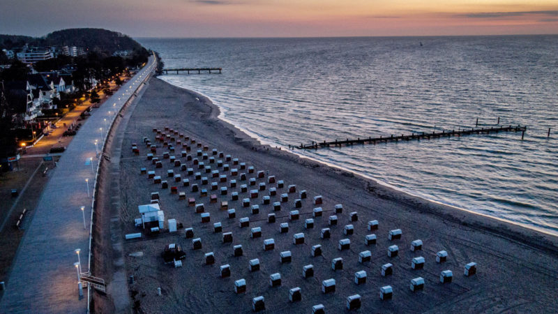 Beach chairs are lined up at the Baltic Sea in Travemuende, northern Germany, before sunrise on Sunday, April 18, 2021. (Photo/RSS)