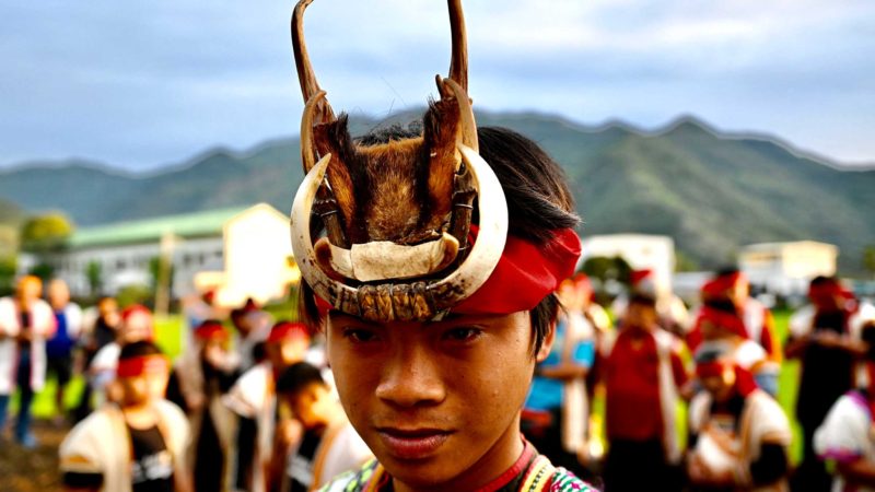 This picture taken on May 1, 2021 shows a young Indigenous priest (C) surrounded by his clansmen during a festival at a village in Chishang township, Taitung county. - Taiwan's 16 recognised Indigenous tribes led a comparatively uninterrupted life for thousands of years before immigrants first began arriving from the Chinese mainland in the 17th century. (Photo by Sam Yeh / AFP) / TO GO WITH Taiwan-indigenous-hunting-culture-court,FOCUS by Amber WANG