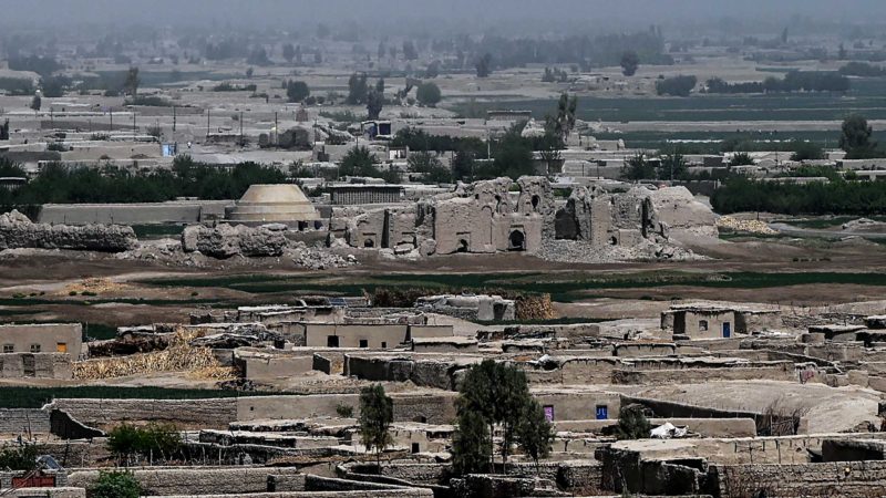 In this photograph taken on March 27, 2021, the ruins of a palace near the historic fortress of Qala-e-Bost is seen in Bost on the outskirts of Lashkar Gah, Helmand Province. - Once the winter residence of sultans from illustrious Islamic dynasties, the ruins of a thousand-year-old royal city in southern Afghanistan has become home to hundreds of people who have fled Taliban clashes. (Photo by WAKIL KOHSAR / AFP) / TO GO WITH'Afghanistan-conflict-archeology-culture',FOCUS by Elise BLANCHARD and Rashid DURRANI