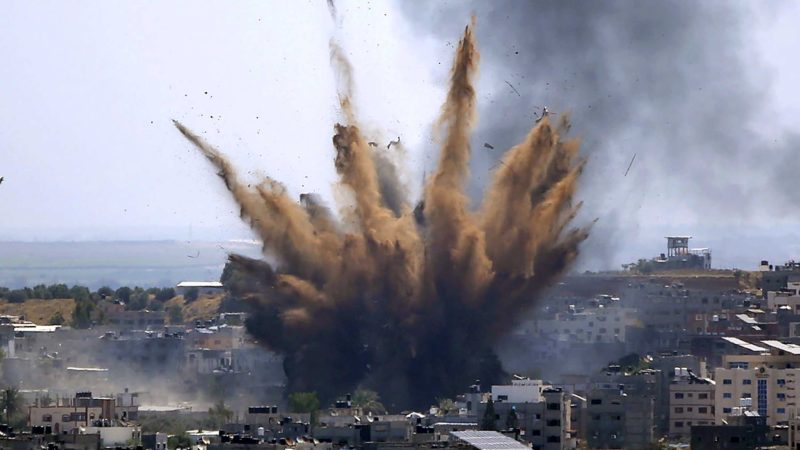 Smoke rises following Israeli airstrikes on a building in Gaza City, Thursday, May 13, 2021. (AP Photo/Hatem Moussa)