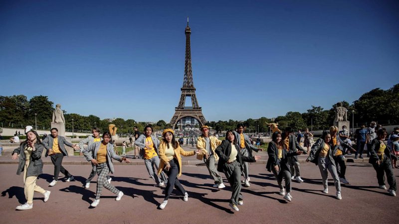 TOPSHOT - Dancers from Shee'z's group perform at the Trocadero Square in front of the Eiffel Tower in Paris, on June 13, 2021. (Photo by Sameer Al-DOUMY / AFP)