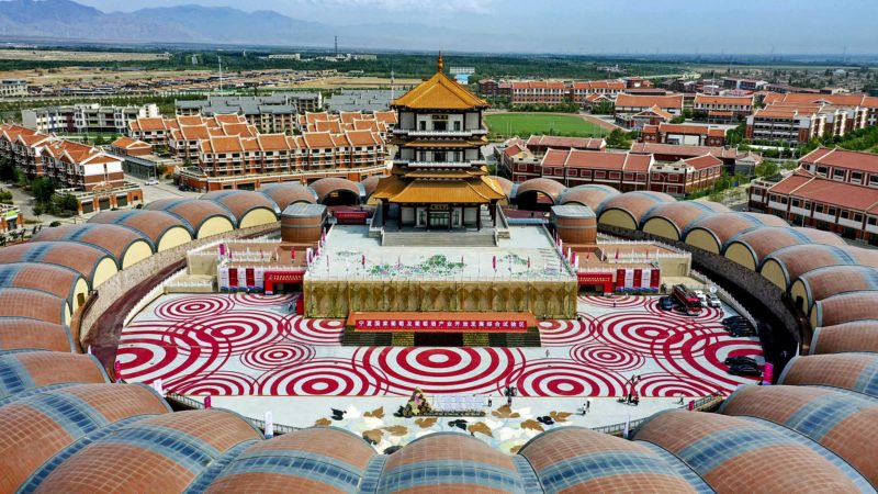 (210717) -- YINCHUAN, July 17, 2021 (Xinhua) -- Photo taken on July 10, 2021 shows the National Open Development Comprehensive Pilot Zone for Grape and Wine Industry in Minning Township, northwest China's Ningxia Hui Autonomous Region. (Xinhua/Feng Kaihua)