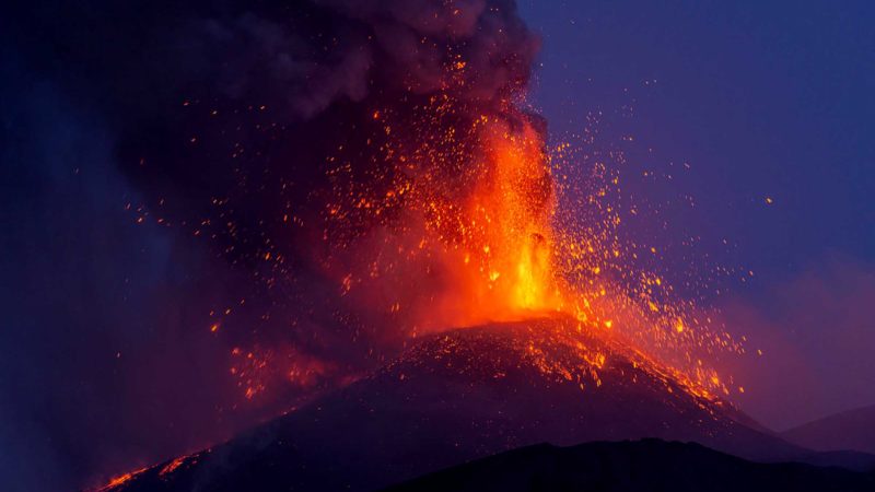 Smoke billows from the Mt Etna volcano as seen from Milo, Sicily, Monday, Aug. 9, 2021. Europe's most active volcano remains active scattering ashes around a vastly populated area on its slopes. (AP Photo/Salvatore Allegra)