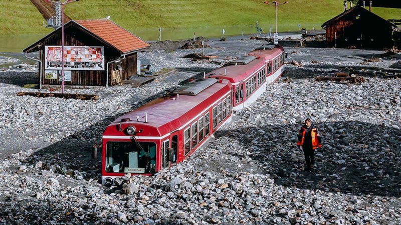 A stucked train after flooding is pictured in Wald im Pinzgau near Salzburg, Austria, on August 17, 2021. - Storms have battered large parts of Austria since late August 16 with landslides and flooding hitting especially Austria’s western regions of Pinzgau and Pongau in the state of Salzburg, bordering Germany. Some 100 people stuck in cars as landslides hit roads had to be rescued, while three people have been injured. (Photo by JFK / various sources / AFP) / Austria OUT