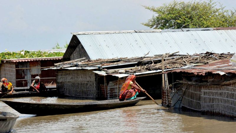  MORIGAON (INDIA), Aug. 30, 2021 (Xinhua) -- Villagers travel by boats in a flood-affected village in Morigaon district of India's northeastern state of Assam, on Aug. 30, 2021. (Str/Xinhua)