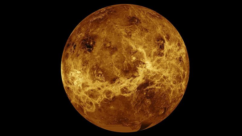 FILE - In this file photo made available by NASA shows the planet Venus made with data from the Magellan spacecraft and Pioneer Venus Orbiter.  Two spacecraft are set to swoop past Venus within hours of each other this week, using the manoeuvre to do a little bit of bonus science on the way to the center of our solar system, starting with the Solar Orbiter probe operated by NASA and the European Space Agency early Monday Aug. 9, 2021  (NASA/JPL-Caltech FILE via AP)