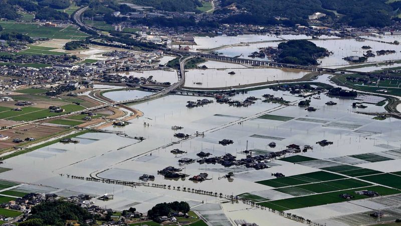 An aerial view shows a flooded area caused by torrential rain in Takeo, Saga prefecture, southwestern Japan, Sunday, Aug. 15, 2021. Heavy rain has dumped on southwestern Japan since last week. (Kyodo News via AP)