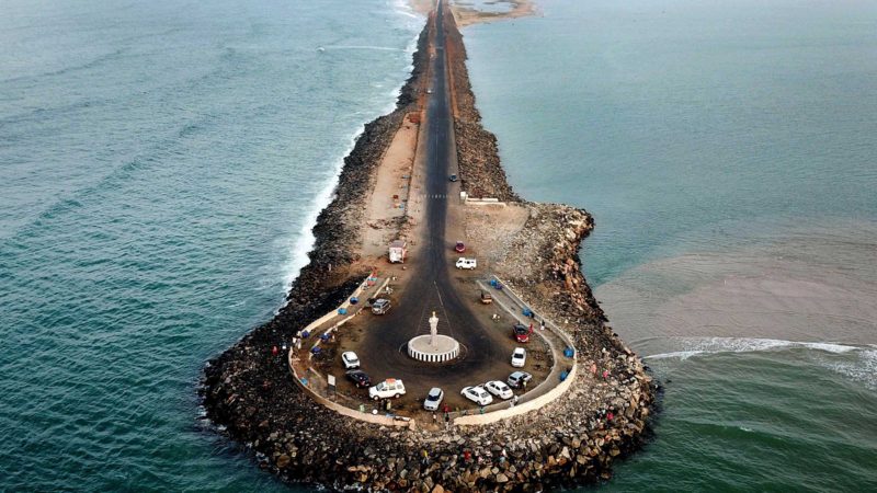 An aerial view shows visitors at the south-eastern tip of Pamban Island in Tamil Nadu state, in Dhanushkodi on September 25, 2021. (Photo by Arun SANKAR / AFP)