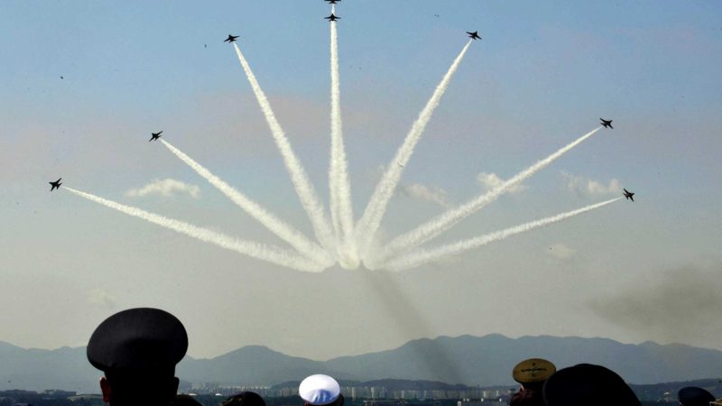 TOPSHOT - South Korean military officials watch a flypast as they participate in an exercise on the 73rd anniversary of Armed Forces Day in Pohang on October 1, 2021. (Photo by SONG Kyung-Seok / POOL / AFP)