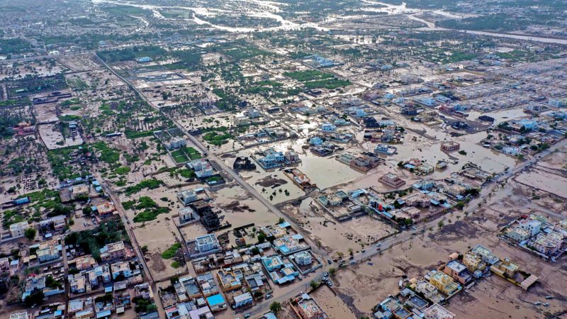 An aerial view shows the aftermath of tropical Cyclone Shaheen in al-Khaburah city of al-Batinah region on October 4, 2021. - At least 11 people died after a powerful cyclone struck Oman causing widespread flooding and landslides, emergency authorities said. Seven of the victims died in the Batinah region, the National Committee for Emergency Management said without giving details. More people are missing, it added. (Photo by Haitham AL-SHUKAIRI / AFP)