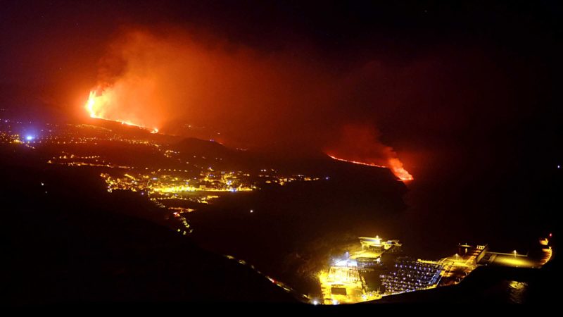 Lava from a volcano reaches the sea on the Canary island of La Palma, Spain in the early hours of Wednesday Sept. 29, 2021. Lava from the new volcano on the Canary Island of La Palma reached the Atlantic ocean last night, at the area known as Los Guirres beach, also known as Playa Nueva (New Beach). (AP Photo/Daniel Roca)