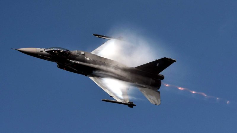 An Hellenic Air Force F-16 flies as it attends a military parade, in Thessaloniki on October 28, 2021, during the celebrations marking Greece's National "Oxi" (No) Day, commemorating Greece's refusal to accept the ultimatum advanced by fascist Italy in 1940 during World War II. (Photo by Sakis MITROLIDIS / AFP)