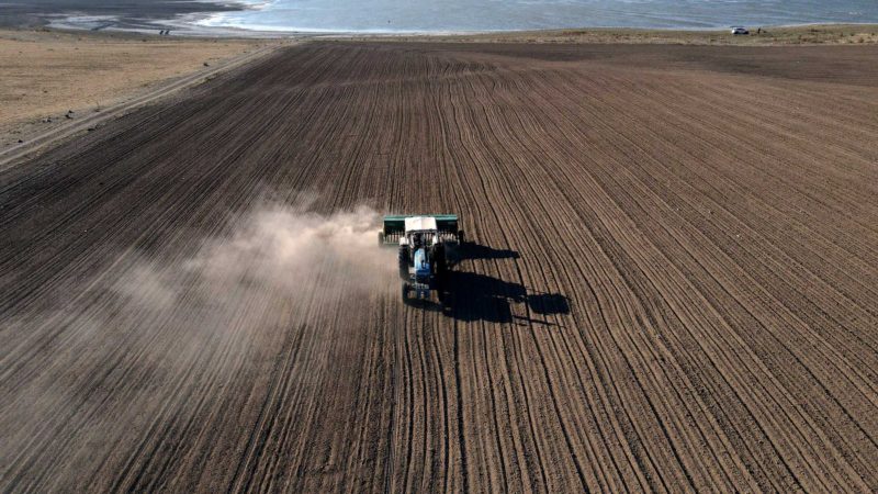 (211024) -- GOLBASI (TURKEY), Oct. 24, 2021 (Xinhua) -- Aerial photo taken on Oct. 24, 2021 shows a farmer working in a field in Golbasi, Ankara, Turkey. (Photo by Mustafa Kaya/Xinhua)