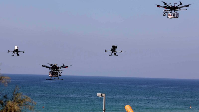 (211013) -- TEL AVIV, Oct. 13, 2021 (Xinhua) -- A presentation to the media shows drones delivering goods in the coastal Israeli city of Tel Aviv on Oct. 11, 2021. Israel's National Drone Initiative on Monday launched its third phase of trials on drone delivery operations with a demonstration to the media held in Tel Aviv.
 The two-year government project aims to create a national network for using commercial drones to deliver goods,  including medicine, food, medical equipment and more, to the customers who order them online. (Photo by Gil Cohen Magen/Xinhua)