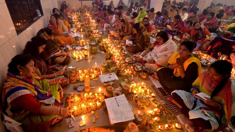 (211113) -- DHAKA, Nov. 13, 2021 (Xinhua) -- Hindu devotees sit for prayer with burning incense and oil lamps during the Rakher Upobash, a religious fasting festival, at a temple in Dhaka, Bangladesh, on Nov. 13, 2021. (Xinhua)