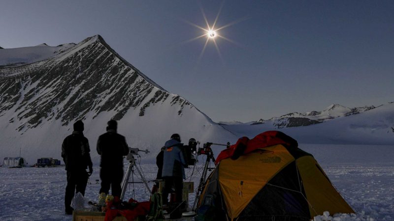 (211204) -- SANTIAGO, Dec. 4, 2021 (Xinhua) -- Scientists from the Chilean Union Glacier Station observe a total solar eclipse in Antarctica, Dec. 4, 2021. (Felipe Trueba/Image of Chile Foundation/Handout via Xinhua)